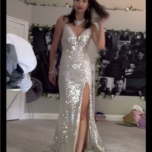 My prom dress, cost me 595 Couture silver sequin dress